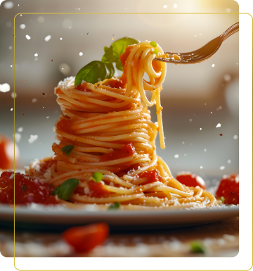 Un piatto di spaghetti perfettamente impiattati, con salsa di pomodoro, basilico fresco e una spolverata di formaggio. La fotografia mette in evidenza la consistenza della pasta e il colore vivace della salsa, creando un'atmosfera appetitosa.